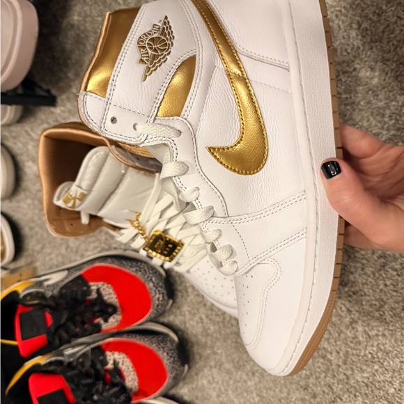 Nike Shoes - Nike Jordan Air 1 Retro Women's White and Metallic Gold High-Top Sneakers